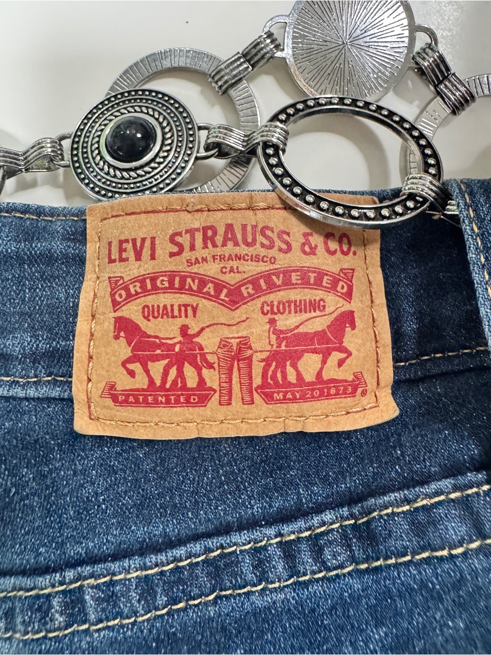 Levi's High Rise Jeans in Blue with Tan Patch